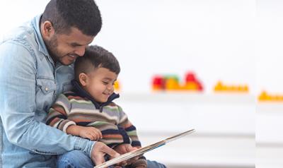 A parent reading with a child.